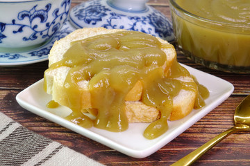 Traditional Thai custard is a common dipping sauce for fresh breads of all sorts. Selctive focus.