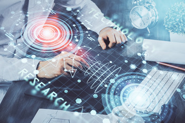 Multi exposure of man's hands holding and using a digital device and data theme drawing. Innovation concept.