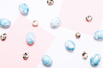 Happy Easter background. Easter eggs on white background, top view