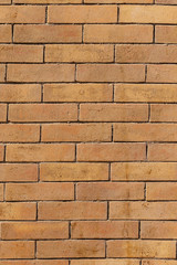 Burnt brick. Wall with rough brickwork.