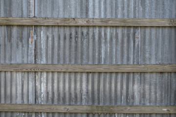 Corrugated Metal Fence With Rustic Wood