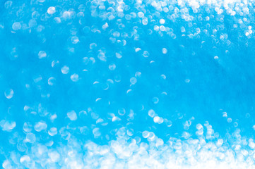 Abstract blue background with bokeh around the edges