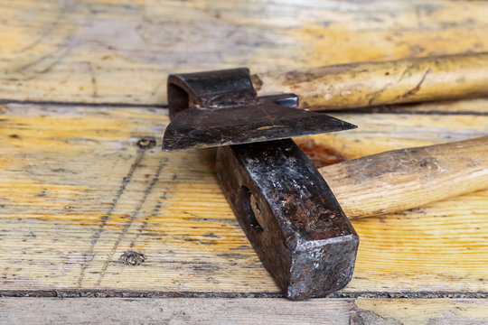 ax hammer closeup black on wooden background construction set