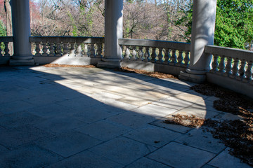 An Old Large Ornamental Balcony With Dead Leaves Scattered Around
