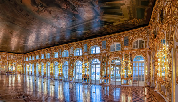 Ornate golden interior of the Great Hall, the most spacious premise of the Catherine Palace in Tsarskoe Selo (Pushkin), St. Petersburg, Russia.