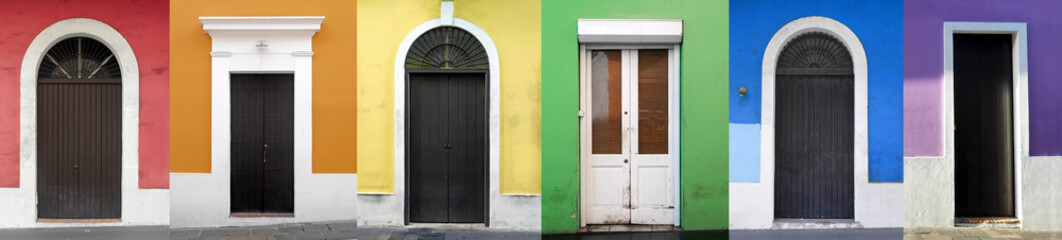 A panoramic rainbow collage of multicolored doors in Red, Orange, Yellow, Green, Blue & Purple...