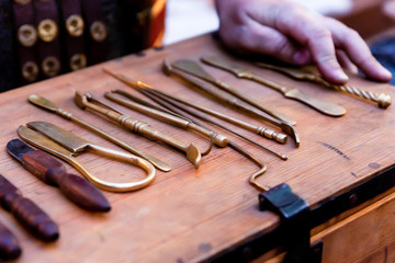 old surgical medical instruments help people, military medicine of the middle ages