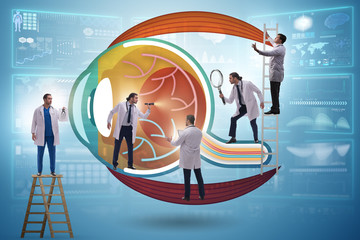 Doctor examining giant eye in medical concept