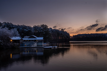 Early morning twilight at the boathouse at Lake Johnson Park in Raleigh, North Carolina. Just after a rare snow.