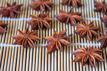 Star Anise on the bamboo mat close up