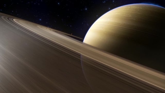 Saturn with aurora in the solar system. Spectacular flight over Saturn rings. Some of the material is from NASA/JPL/Space Science Institute