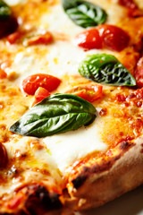 Pizza margherita, tomato and basil 