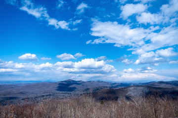 Beautiful blue sky, white clouds in the mountains