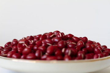 Red beans on a white plate
