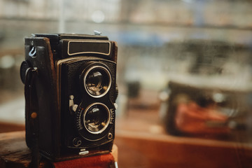 Classic and old film camera, collectibles. retro technology. vintage color tone.