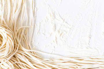 Fresh ramen noodles on white background