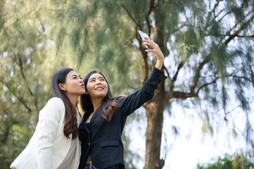 business women using Smartphone for take a photo