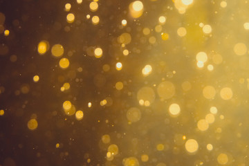 Dark Abstract Gold bokeh sparkle on black
