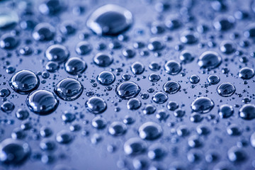 Water droplets on blue