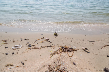 Plastic junk garbage dirty on the beach environment pollution