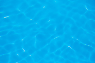 Blue water ripple reflection in the swimming pool