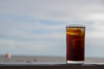 Cola with ice in the glass ready to drink for refresh