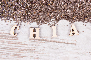 Heap of chia seeds, concept of food containing natural vitamins, fiber and minerals