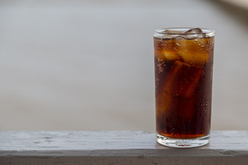 Cola with ice in the glass ready to drink for refresh