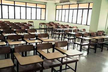 Vintage image of Desk and chairs in classroom