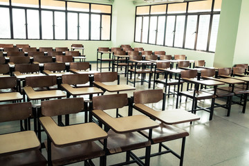 Vintage image of Desk and chairs in classroom
