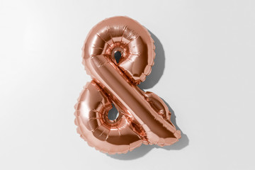 Ampersand symbol or &, Rose gold foil balloon alphabet isolated on a white background with Clipping Path