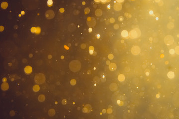 Dark Abstract Gold bokeh sparkle on black