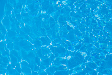 Blue water ripple reflection in the swimming pool