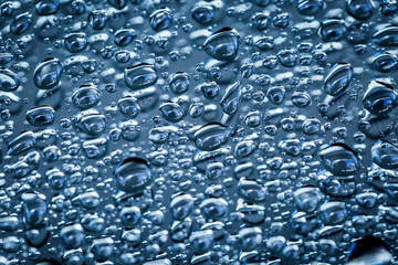 Water droplets on blue