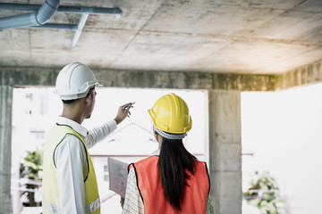 Team of worker, Inspector or engineers is checking, inspecting and discussing plan to renovation the building or house. Inspection and Engineering concept.