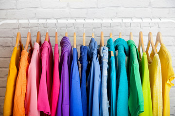 Fototapeta Women's wardrobe sweatshirts shirts and blouses obraz