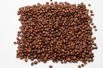 coffee beans close up on a white isolated background,copy space.