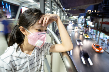 Tired asian child girl have headache,fatigue,exhaustion,difficulty in breathing,symptoms of...