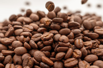 brown background of coffee grains in dropcopy space.