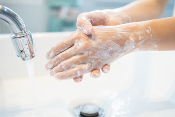 Hygiene,Hands of child girl rubbing her hands,washing frequently with soap,avoid contamination of viruses,outbreak of Covid-19,disinfection,cleaning hand to stop spread bacteria,Coronavirus pandemic