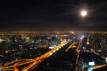 Fototapeta na wymiar Cityscape Bangkok downtown at night, from the top of tower BAIYOKE Sky, 