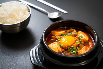 ‘Kimchi Jjigae’ or Kimchi Soup with Tofu and Egg or Korean Kimchi Stew