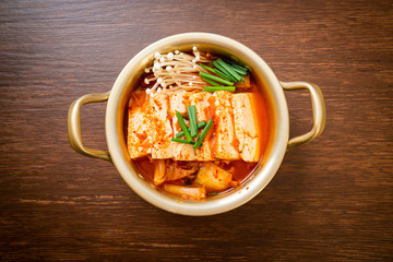 ‘Kimchi Jjigae’ or Kimchi Soup with Soft Tofu or Korean Kimchi Stew - obrazy, fototapety, plakaty