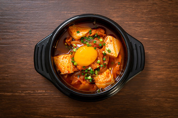 ‘Kimchi Jjigae’ or Kimchi Soup with Tofu and Egg or Korean Kimchi Stew