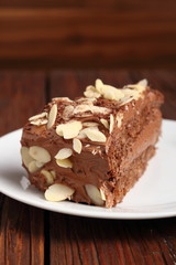 Chocolate sandwich cake garnished with flaked almonds