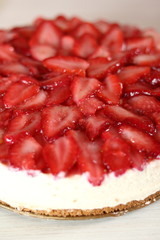 Cake ready to eat. Making frozen strawberry cheesecake series.