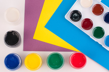 watercolor paints and brushes