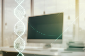 Creative DNA sketch on modern laptop background, biotechnology and genetic concept. Multiexposure