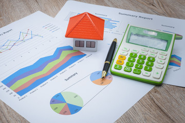 House above the graph or chart Additional economic concepts for high profits for business investment and financial funds.