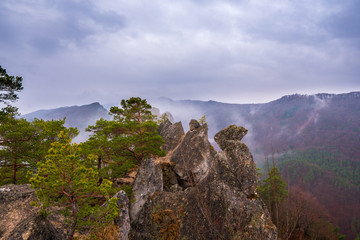 Fototapeta na wymiar Remains of rock city in Sulov Rocks, Súľov Rocks is a Slovak national nature reserve. Slovakia Sulovske Rocks